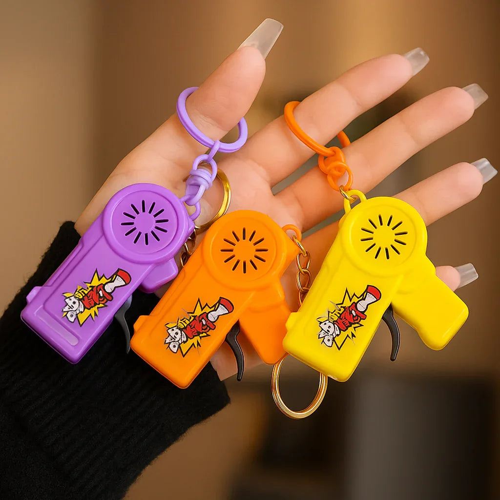 Mini Gun Style Keychain – Cool Metal Key Holder (Random Color) - Clarify.pk