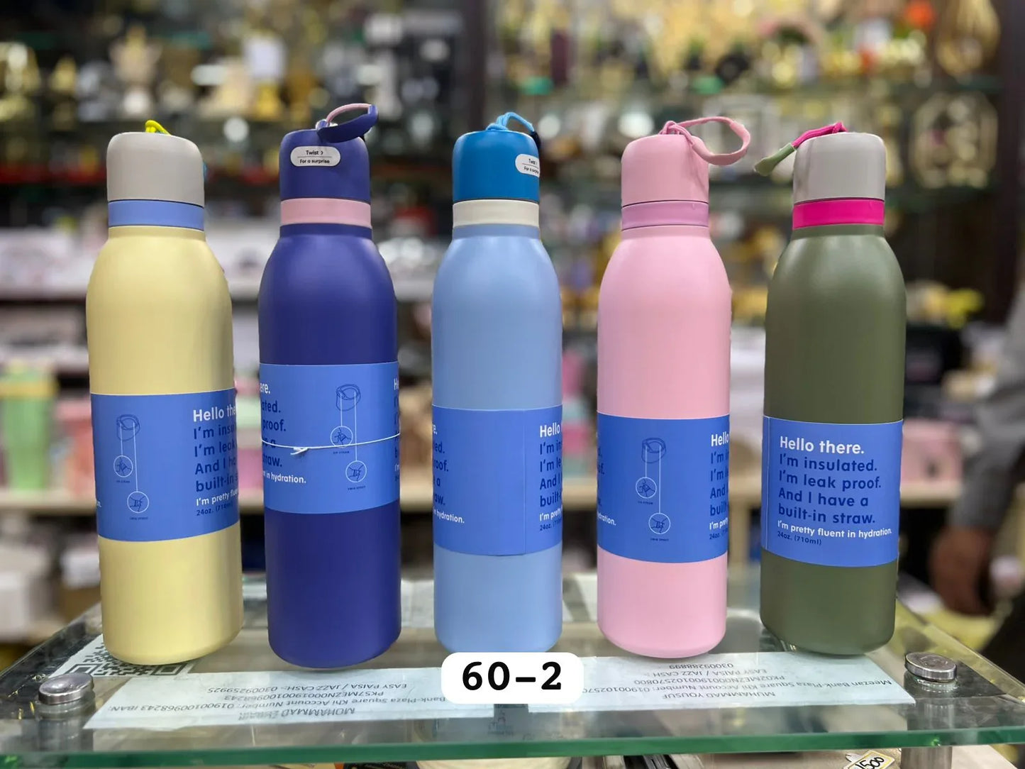 پریمیم 710ml سٹینلیس سٹیل کی بوتل - لیک پروف پانی کی بوتل (بے ترتیب رنگ)