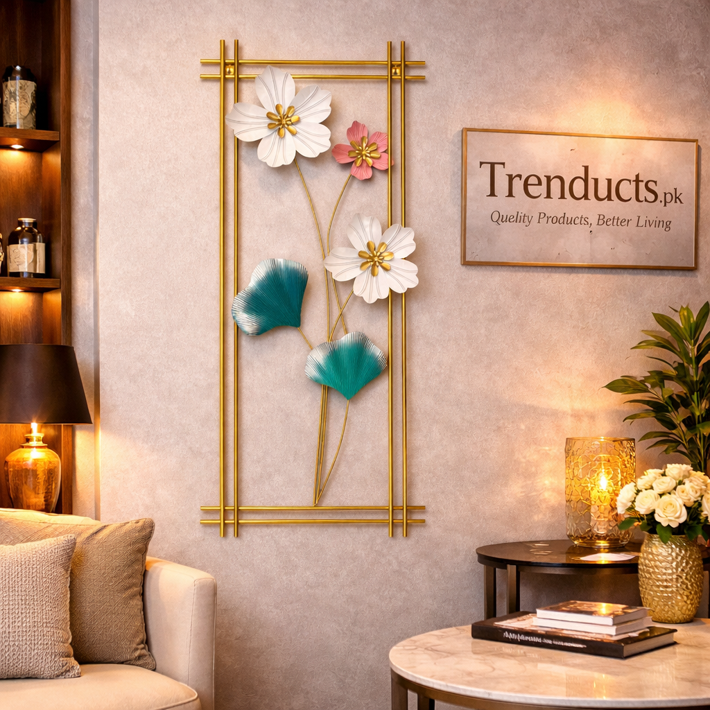 Trenducts luxury brushed gold 3D metal wall motif art piece mounted on a dark-themed feature wall in a modern Pakistani home.
