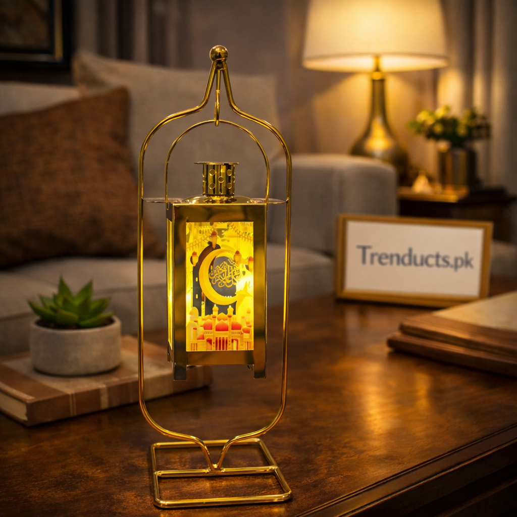 "Gold LED Ramadan lantern with crescent moon and mosque design."
"Vintage black metal lalten with warm flickering LED light for home decor."