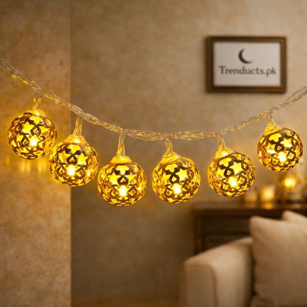 "Trenducts cotton ball string lights in pastel pink and white for aesthetic bedroom decor."
"Hand-woven LED cotton ball fairy lights for festive Ramadan and Eid celebrations in Pakistan."