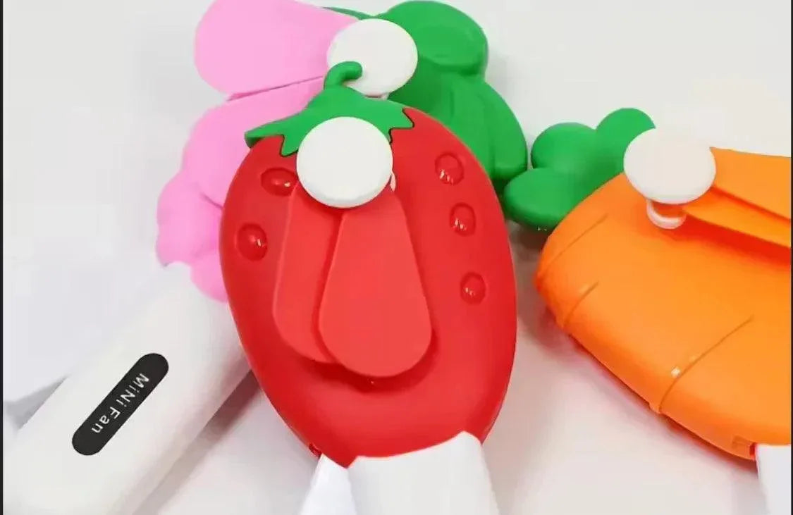 Fruit-Shaped Handheld Fan for Cool Refreshing Breeze - Clarify.pk
