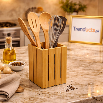 Square natural bamboo cutlery and spoon holder with vertical slatted design on a light wooden surface - Trenducts Pakistan