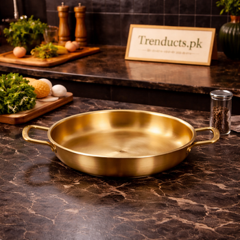 Traditional golden serving wok with two large ring handles and a polished finish on a white background - Trenducts Pakistan
