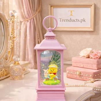 Pink LED bear lantern snow globe with swirling glitter and a yellow bear character scene - Trenducts Pakistan