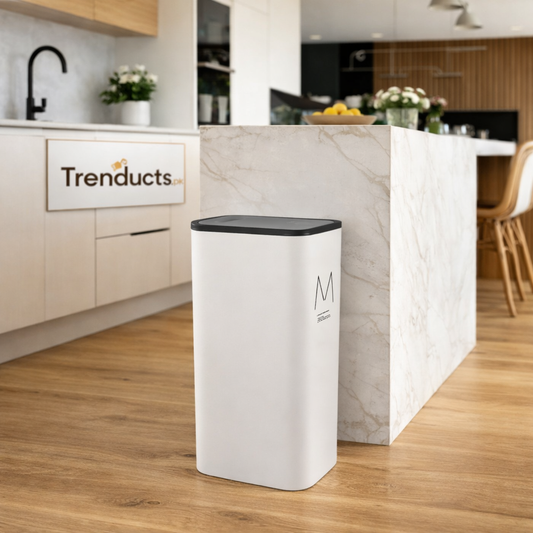 A white slim plastic rubbish bin tucked into a narrow gap next to a bathroom vanity - Trenducts Pakistan