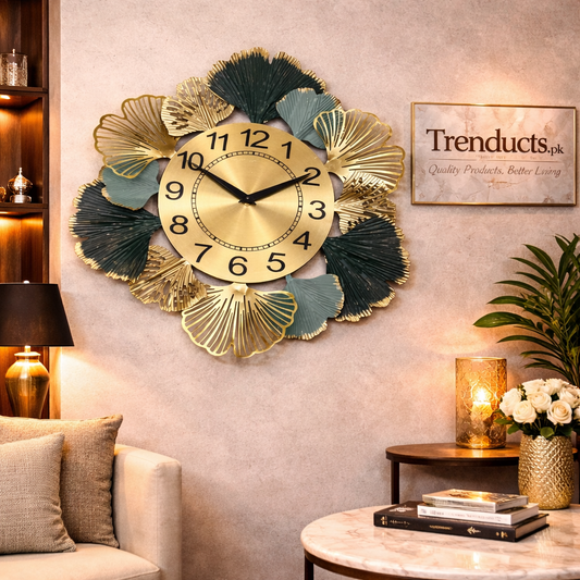 Trenducts luxury champagne gold metal wall clock motif with a silent mechanism on a dark modern feature wall.