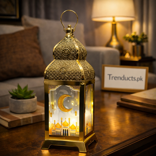 "Gold metal Ramadan lantern with LED light and Nasheed audio feature."

"7x3 inch decorative Islamic lalten with mosque design for Ramadan 2026."