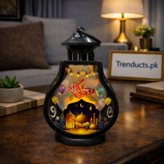 White and black bulb-shaped LED laltens with Ramadan Kareem graphics and mosque illustrations for festive home decor.