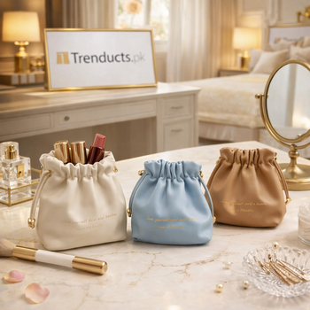 Cute mini lipstick pouch in soft pastel colors, featuring a snap-button closure, displayed on a vanity surface.