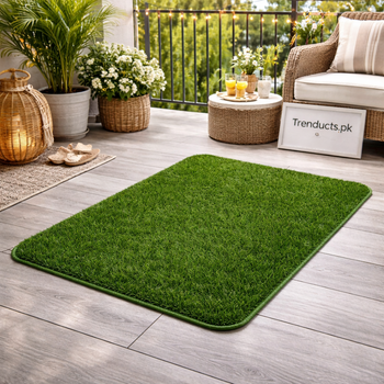 A vibrant artificial grass door mat placed at a front entrance, showing the realistic texture and natural green color.