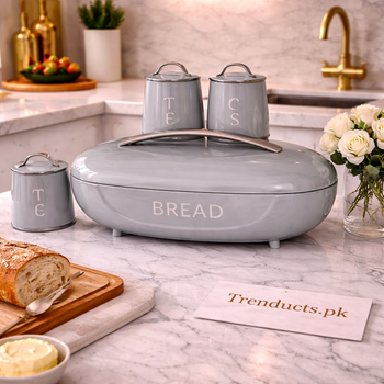 A matching 4-piece matte-finish kitchen storage set featuring a large bread box and three canisters for tea, coffee, and sugar.