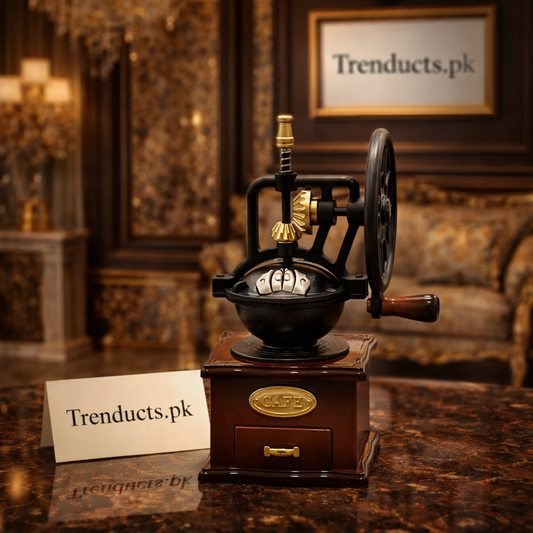 Vintage-style coffee grinder music box with golden gears and a wood-finished base for home kitchen decor.