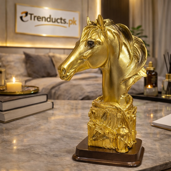 26cm golden horse head bust with a flowing mane standing on a dark mahogany bookshelf in a luxury study.