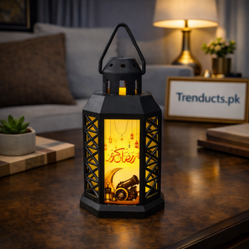Handheld black and gold Ramadan LED metal lanterns with mosque silhouettes and "Ramadan Kareem" calligraphy for home decor.