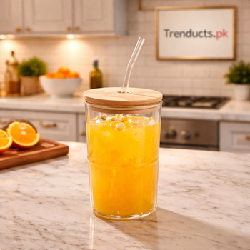500ml faceted aesthetic iced tea glass with bamboo lid and glass straw filled with orange juice and ice - Trenducts Pakistan
