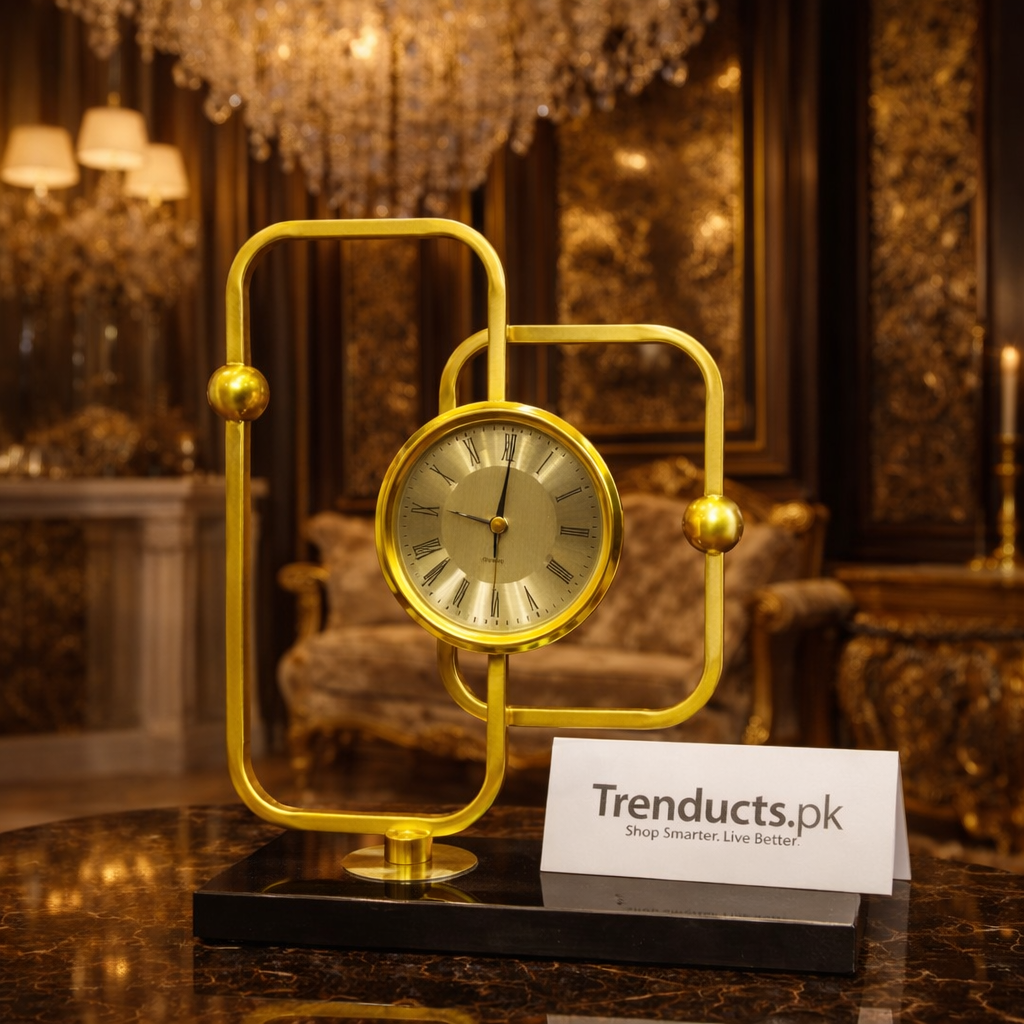 Large gold geometric kinetic wall clock with a 3D wireframe design hanging on a luxury accent wall in a modern living room.