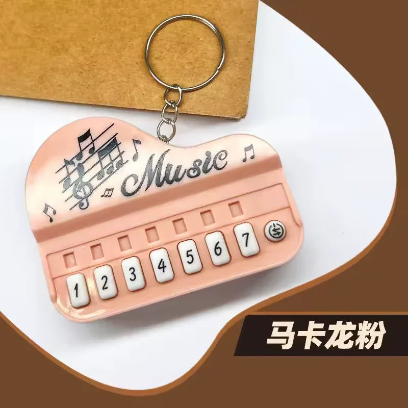Piano Music Keychain – Mini Keyboard Design Gift (Random Color)