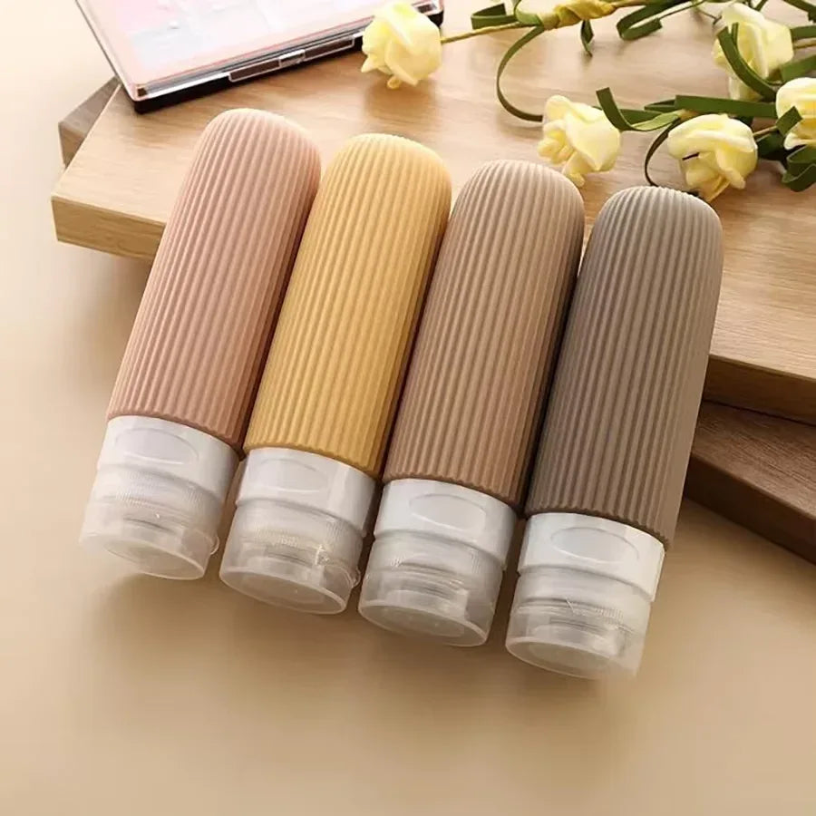 Silicone Travel Lotion Bottle Set – 4 PCS Leak-Proof - Clarify.pk