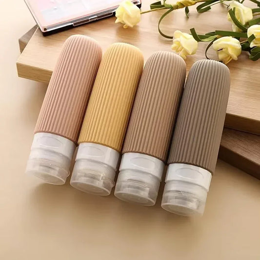 Silicone Travel Lotion Bottle Set – 4 PCS Leak-Proof - Clarify.pk
