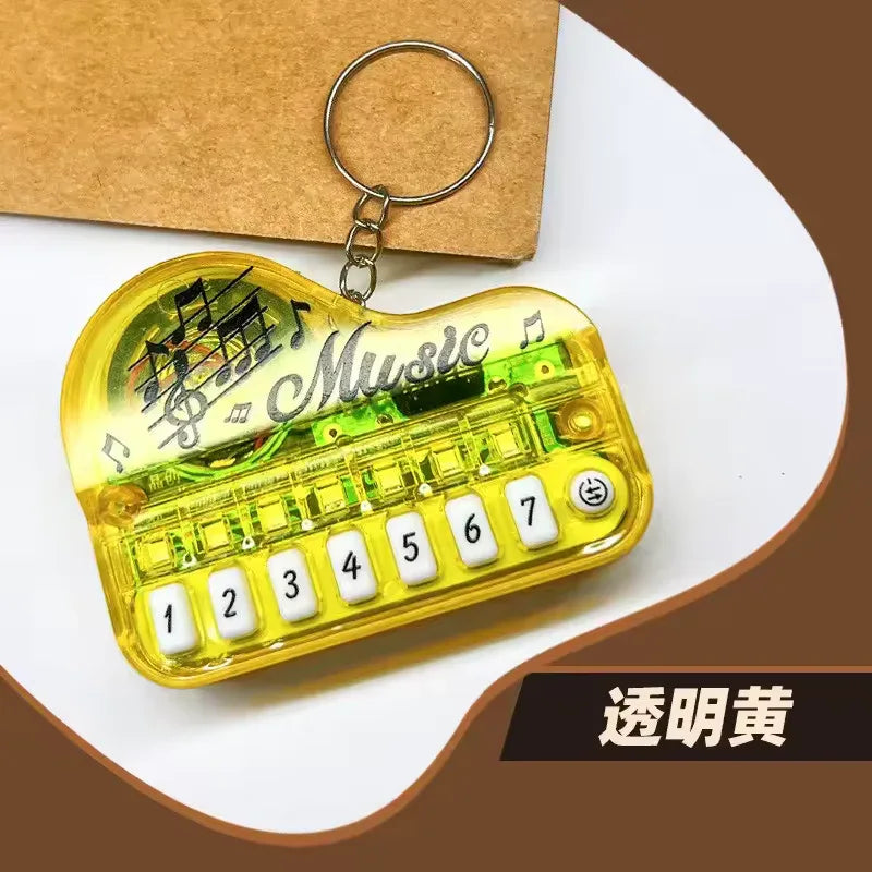 Piano Music Keychain – Mini Keyboard Design Gift (Random Color)