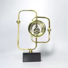 Antique wood-style musical gramophone box with golden horn and rotating record for home decor.