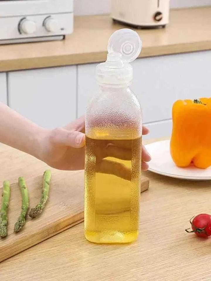 500ML Transparent Oil Bottle - Durable and Refillable Plastic Container - Clarify.pk