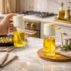 2-in-1 glass oil dispenser bottle and spray mister for kitchen cooking Trenducts Pakistan