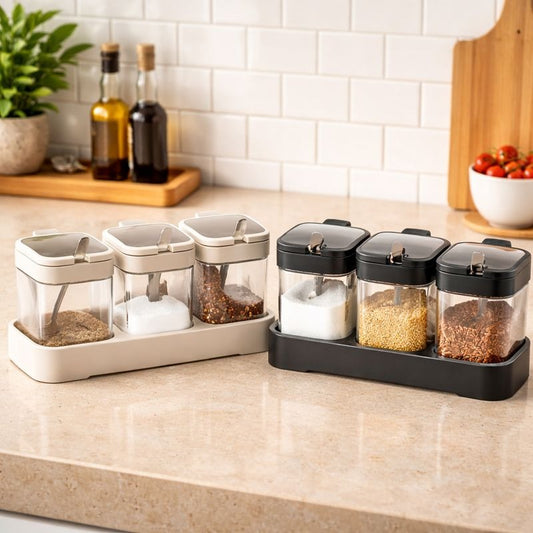 Three square glass spice jars with black flip lids and integrated spoons in a black organizing base - Trenducts Pakistan