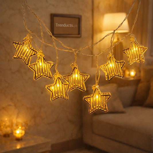 "Trenducts star string lights with warm golden LED glow for Ramadan and Eid home decoration."

"Close-up of crystalline star-shaped fairy lights for festive bedroom ambiance in Pakistan."