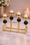 Luxurious 4-Pillar Gold & Matte Black Decorative Candle Stand