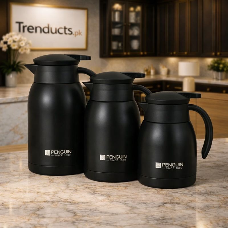 Penguin stainless steel thermal coffee pots in matte black and cream white on a kitchen counter - Trenducts Pakistan