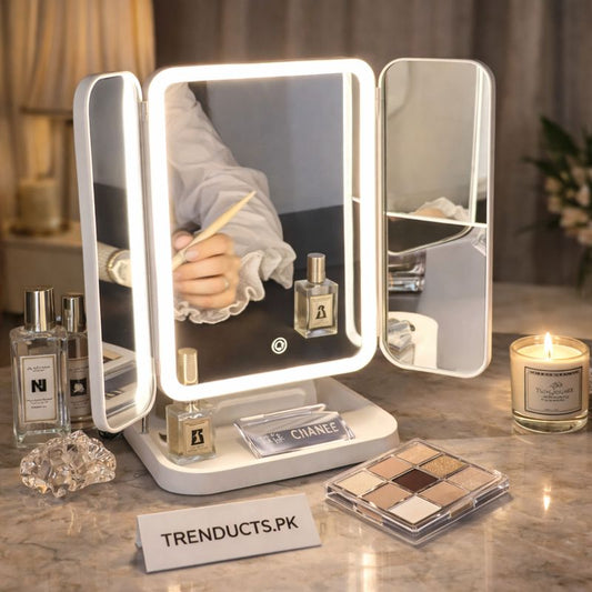 White 3-fold vanity mirror with LED light strips and dual doors open on a modern desktop.