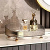 سونے کی ٹانگوں کے ساتھ شفاف ڈریسر اسٹوریج باکس