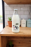 Glass Milk Bottle with Lid – 1 Liter - Clarify.pk