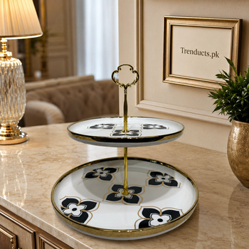 Black floral ceramic 2-tier pastry stand in a luxury dining setting
