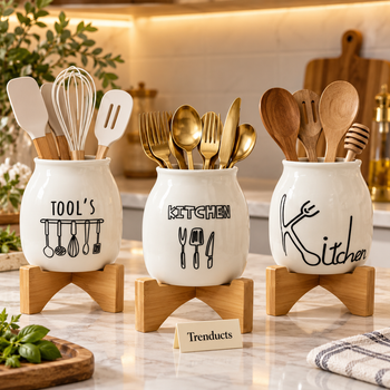 Three designs of white ceramic spoon and cutlery holder with wooden stand on a luxury kitchen countertop