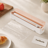 Compact Kitchen Wrap Cutter with Sliding Blade