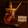 Glass Honey Pot with Wooden Lid & Serving Dipper - Clarify.pk