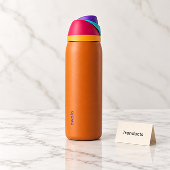 Orange insulated steel water bottle with carry strap on white marble - Trenducts