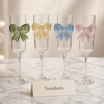 Pink pastel butterfly stemmed glass on white marble | Trenducts