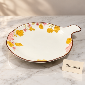Brilliant Round Platter in pink floral design on white marble in a studio | Trenducts