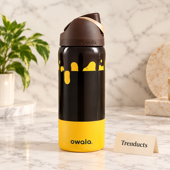 Owala black and yellow water bottle on white marble - Trenducts
