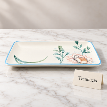 Rectangular Dish in pink magnolia design on white marble in a studio | Trenducts