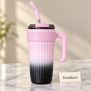 Pink and black insulated tumbler with handle on marble | Trenducts