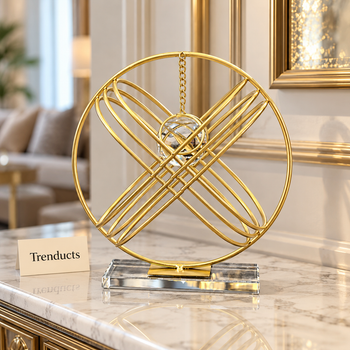 Gold circular wire tabletop decor on a living room console table | Trenducts