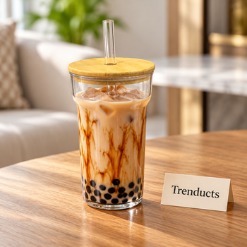 Boba tea glass filled with iced milk tea - Trenducts