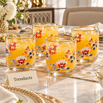 Floral glass set with juice on a dining table | Trenducts