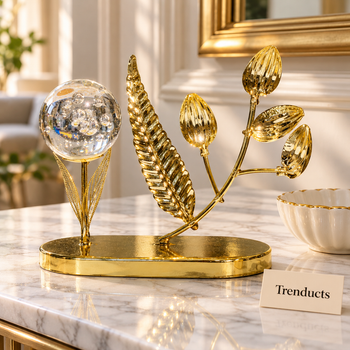 Gold tulip globe showpiece on a living room console table | Trenducts