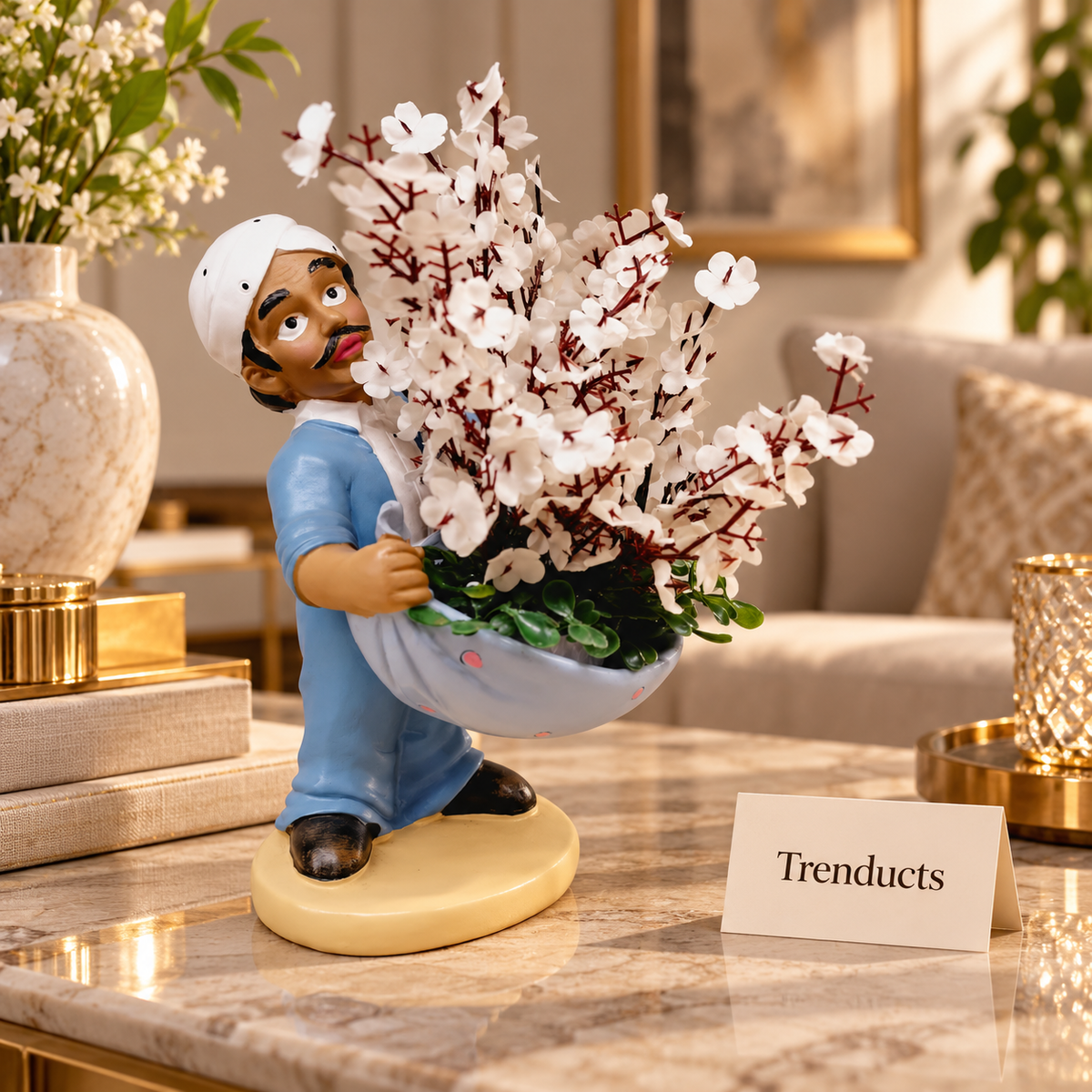 Man Figurine Flower Planter with Artificial White Blossoms